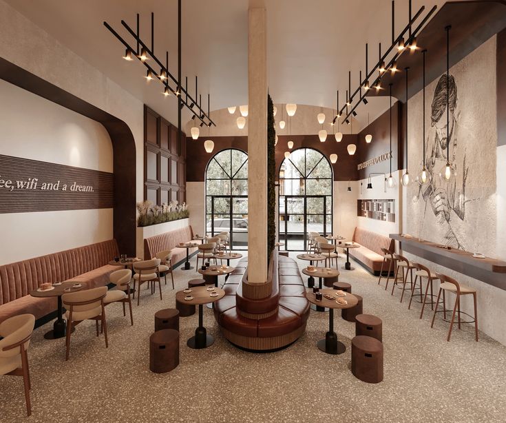 Không gian quán cafe buổi tối với đèn dimmer ấm cúng trong thiết kế thi công cafe Quảng Bình, tạo cảm giác thư giãn