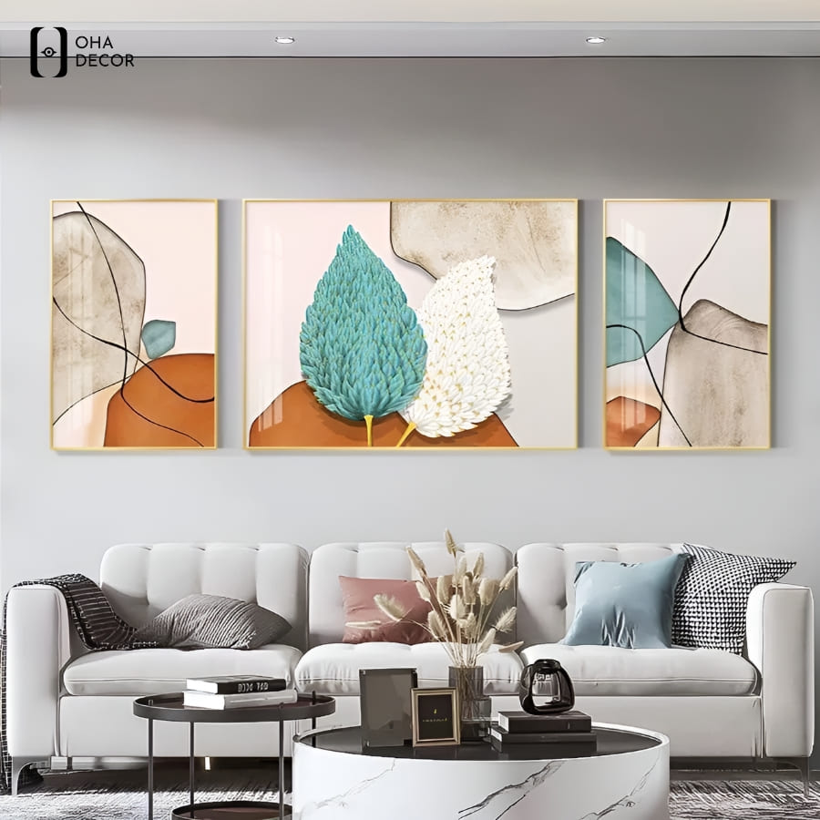 Tuyệt chiêu biến hóa không gian bằng tranh bộ 3 tấm phòng khách Vĩnh Long 5 Treo tranh bộ 3 tấm phòng khách vĩnh long phía sau sofa giúp tạo bố cục cân bằng